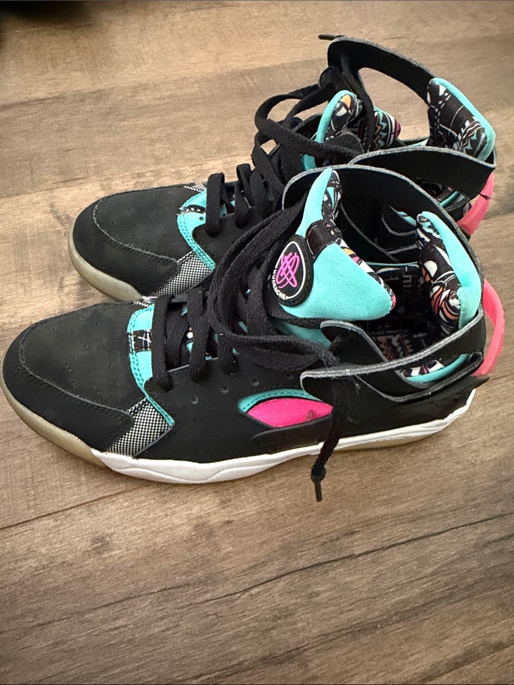 Nike Kids Black High-Top Sneakers with Teal and Pink Accents